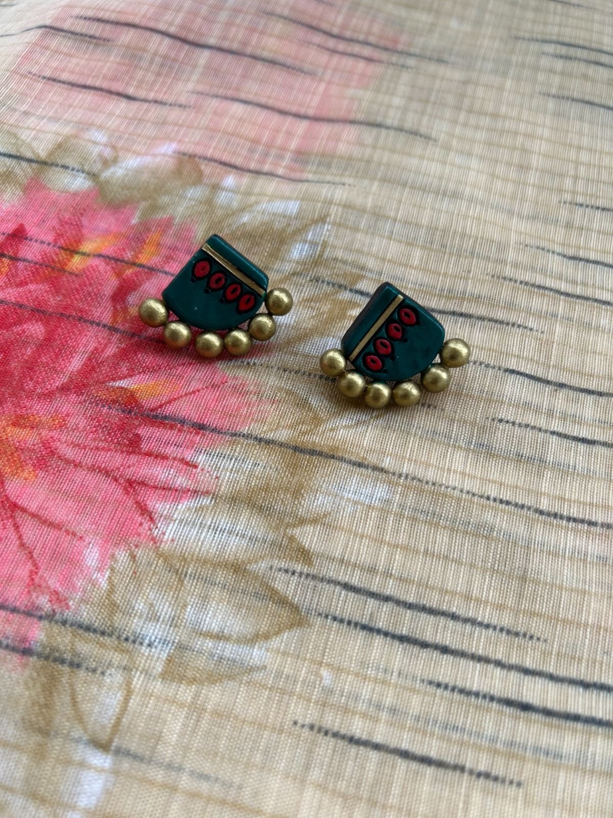 Dark green fan-shaped terracotta studs with gold beads