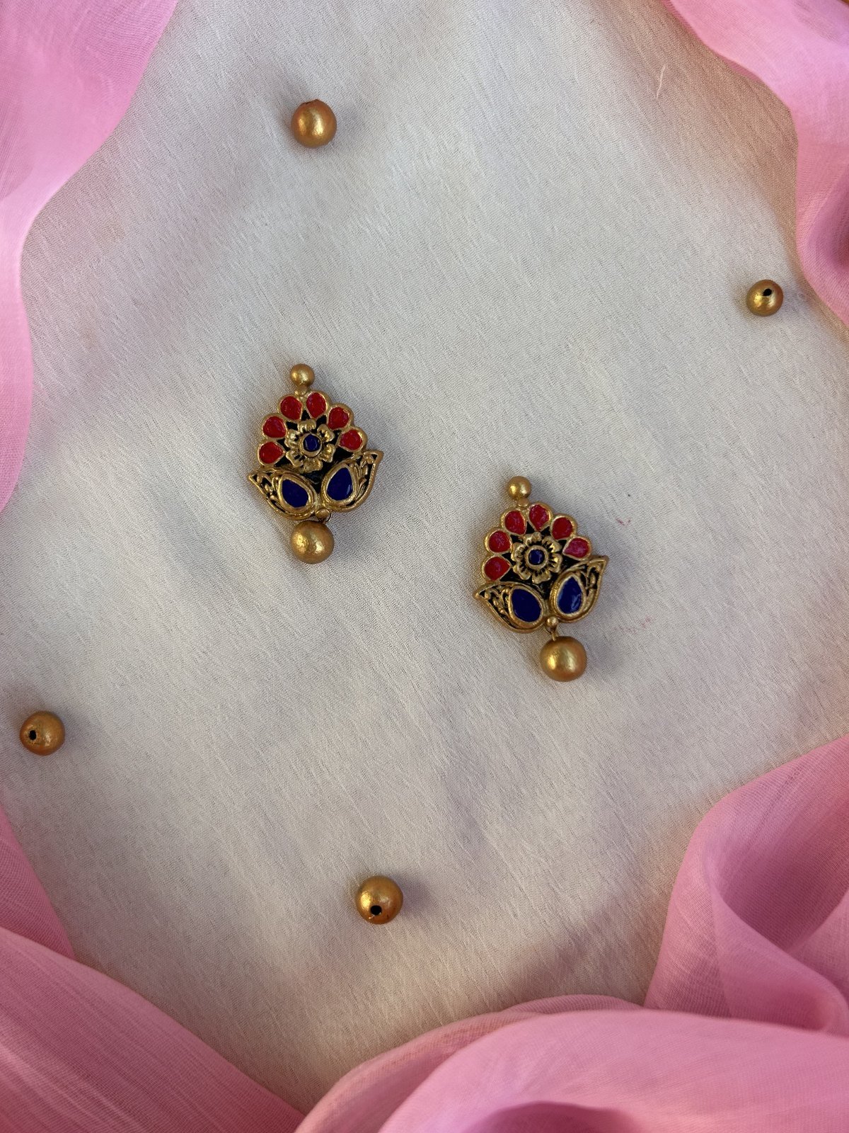 Antique gold terracotta flower studs with red and blue stones