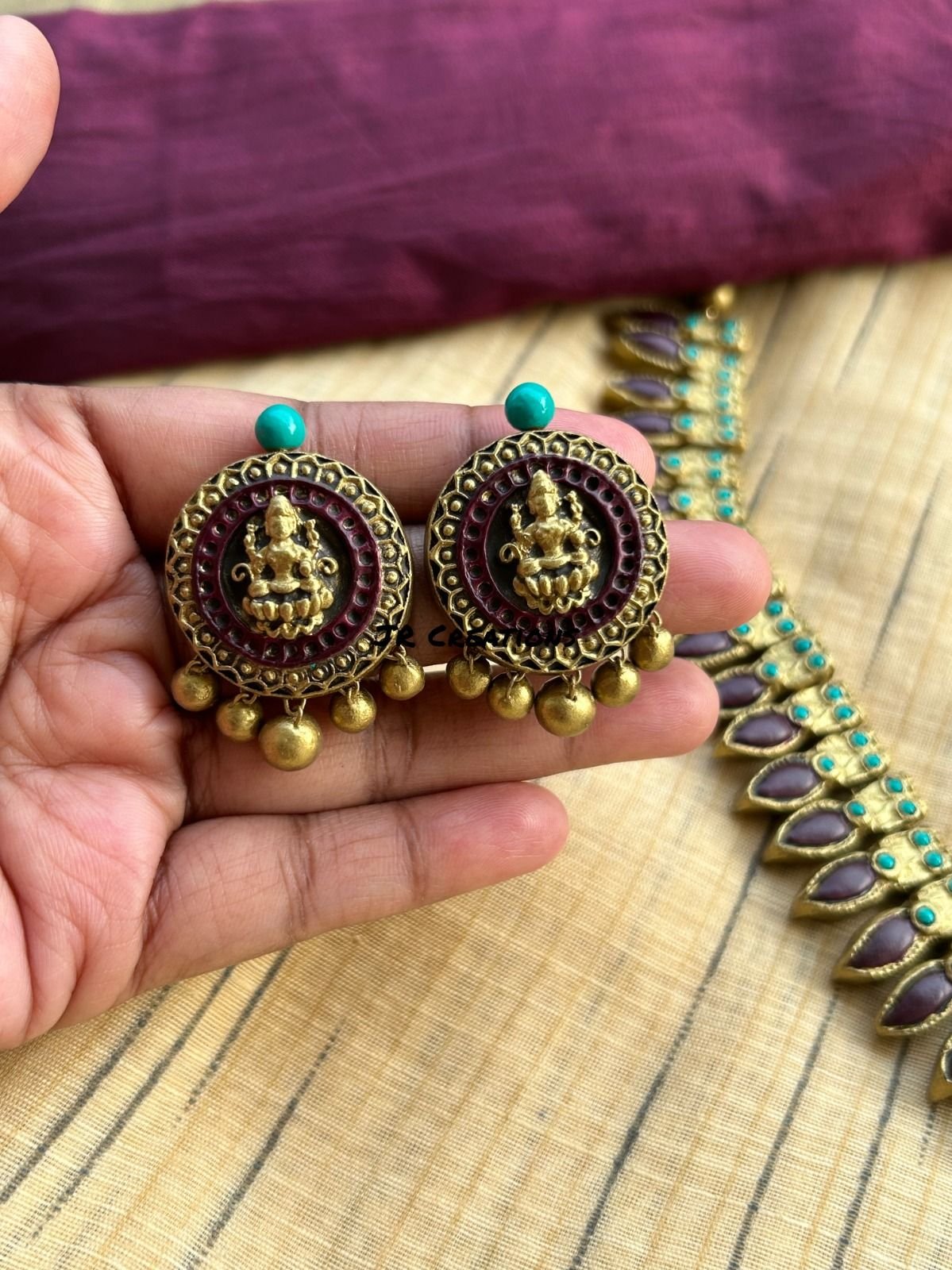 Round terracotta Lakshmi coin studs with gold bead drops
