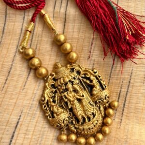 Antique gold Radha Krishna pendant on red thread