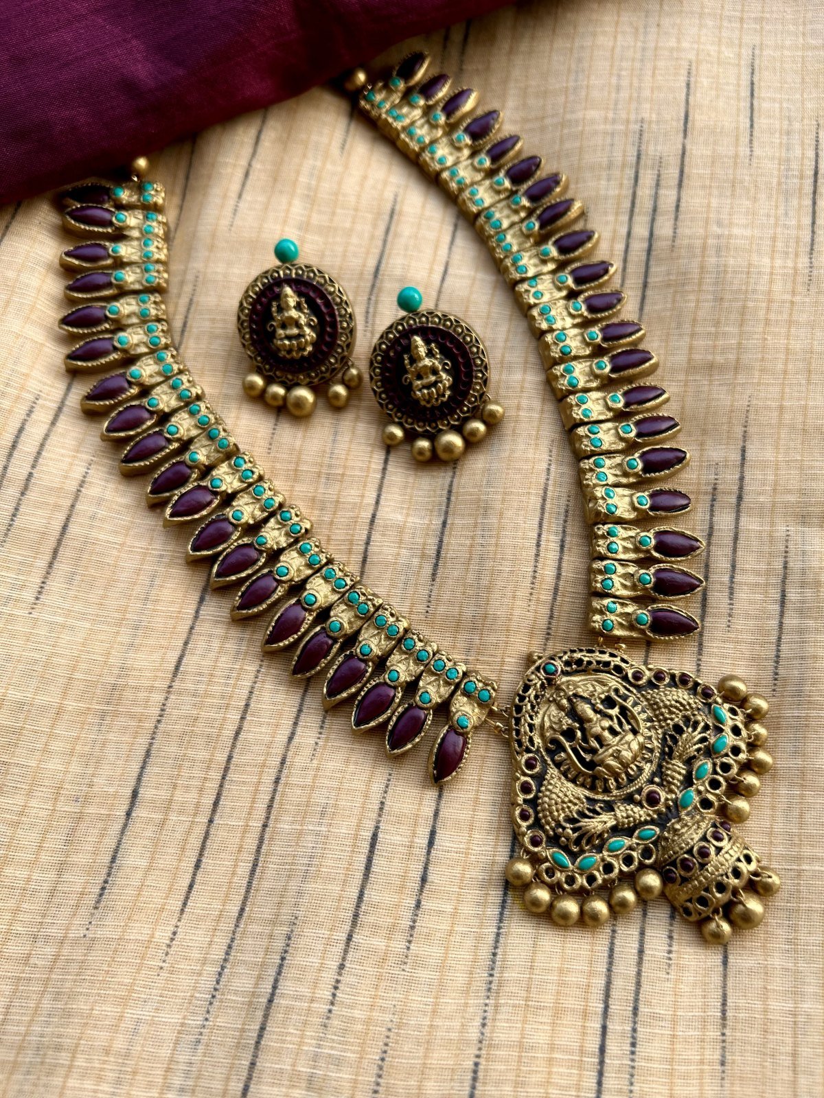 Antique gold, purple and turquoise terracotta Lakshmi haram with studs